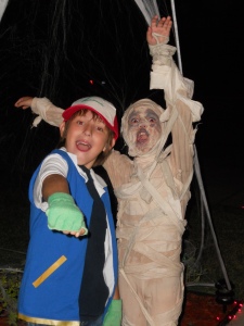 Ash Ketchum and Mr. Mummy from 2010. I had to sew parts of the mummy on him and cut him out of it.
